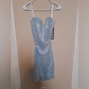 Jovani 07666 Sequin Spaghetti Strap Short Dress Light Blue. Tie up back.